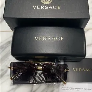 VERSACE CONTEMPORARY RIMLESS GOLD MEDUSA DETAILING / GREY RECTANGLE SUNGLASSES Versace | Accessories | Versace Contemporary Rimless Gold  main image 3